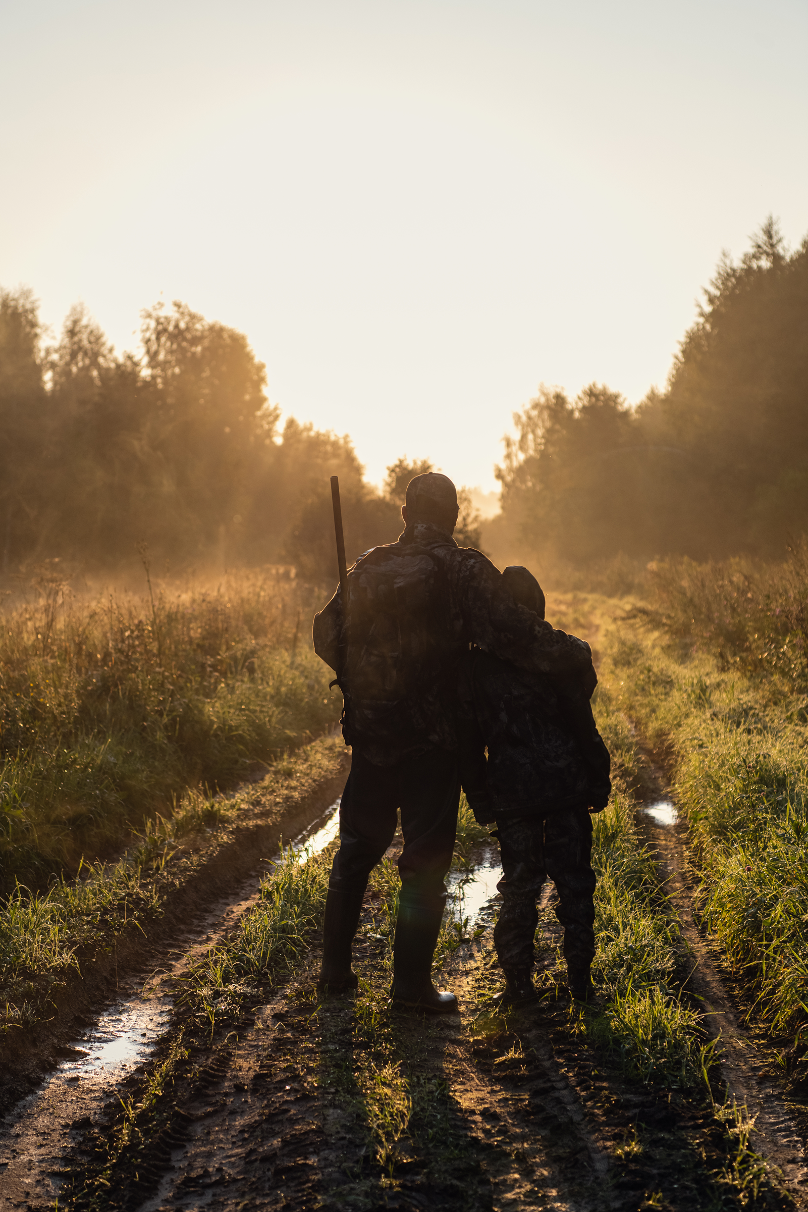 Family hunting together at sunrise